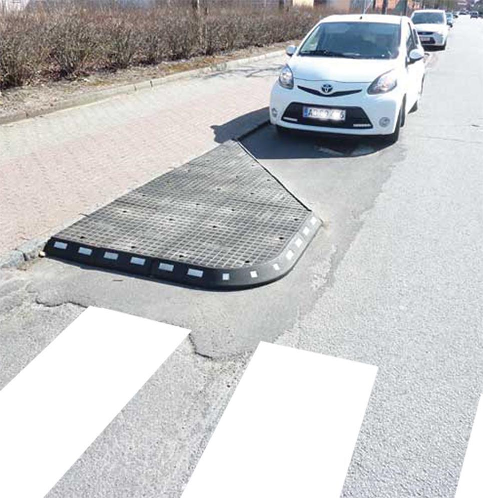 TDJ Standard Helle fra Trafikgummi.dk monteret på Struervej i Holstebro. Let og hurtig at montere. Helleanlæg kan tilskæres og justeres i størrelse om form. TDJ Standard Helle fra Trafikgummi.dk monteret på Struervej i Holstebro. Let og hurtig at montere. Helleanlæg kan tilskæres og justeres i størrelse om form.